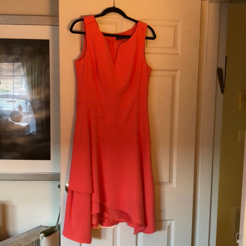Karen Millen sleeveless asymmetrical him orange dress.. 100% polyester.